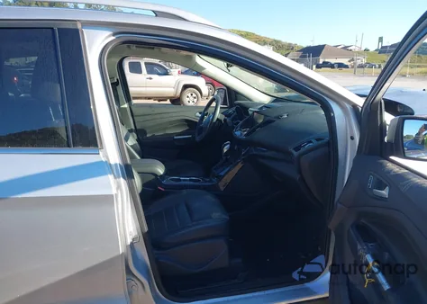 2014 Ford Escape Titanium z USA, uszkodzony, nr VIN 1FMCU9J92EUC05477